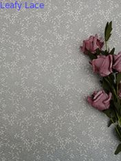 Os licenciados 100% florais pequenos do poliéster da tela da guarnição do marfim atam a tela
