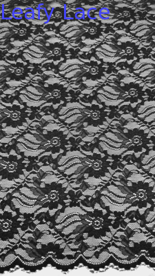 Tecido de renda de largura total em preto elegantes padrões florais e bordas enroladas para roupas de moda